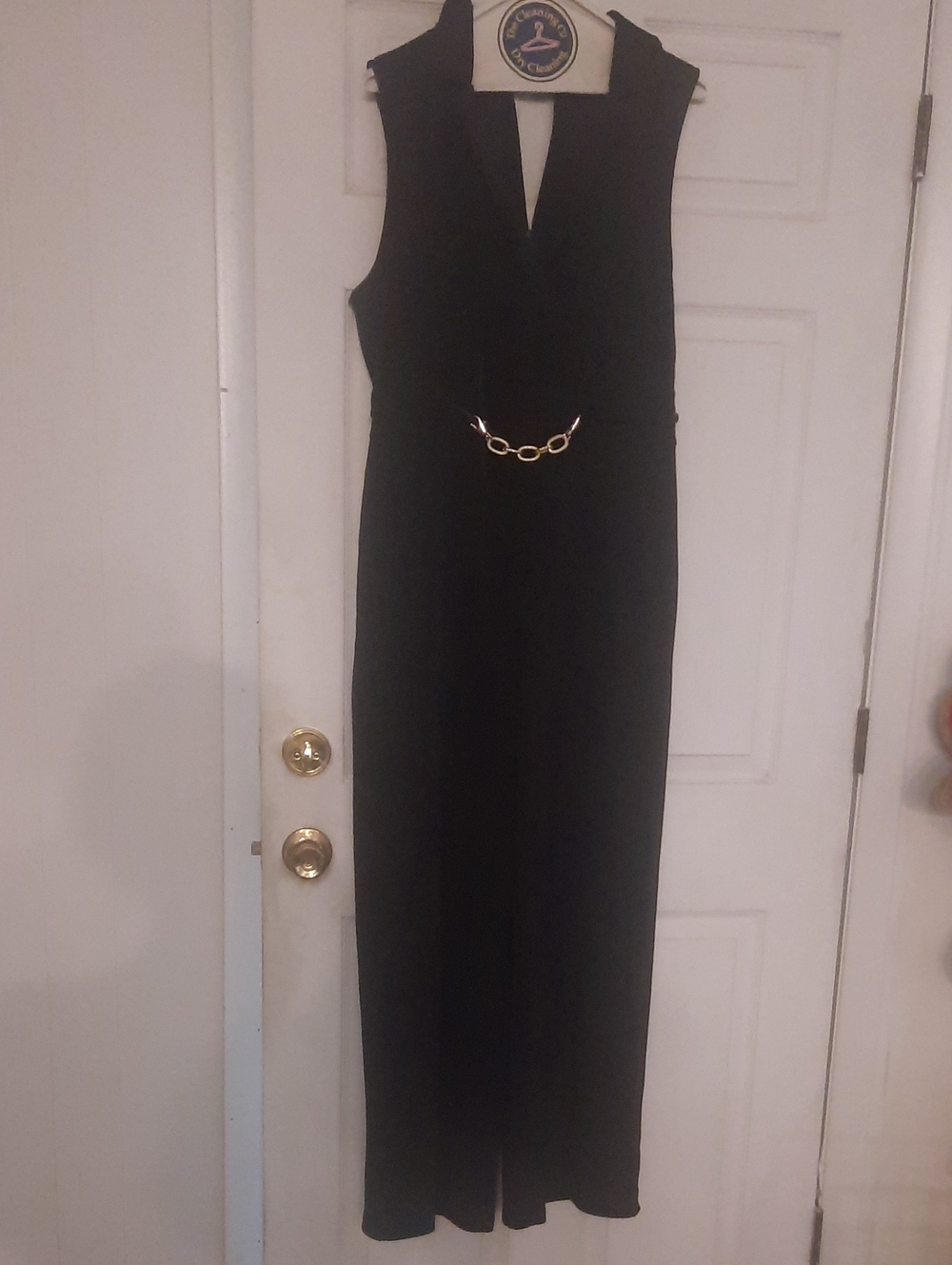 Black Sleeveless V-Neck Jumpsuit with Gold Chain Detail